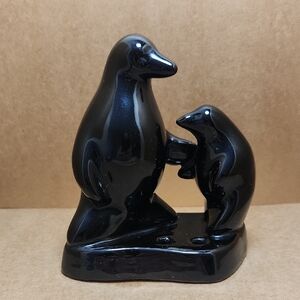 Elegant Black Penguin Sculpture Made With Red Clay